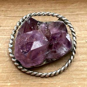 Unique chunky amethyst brooch set and framed in sterling silver.